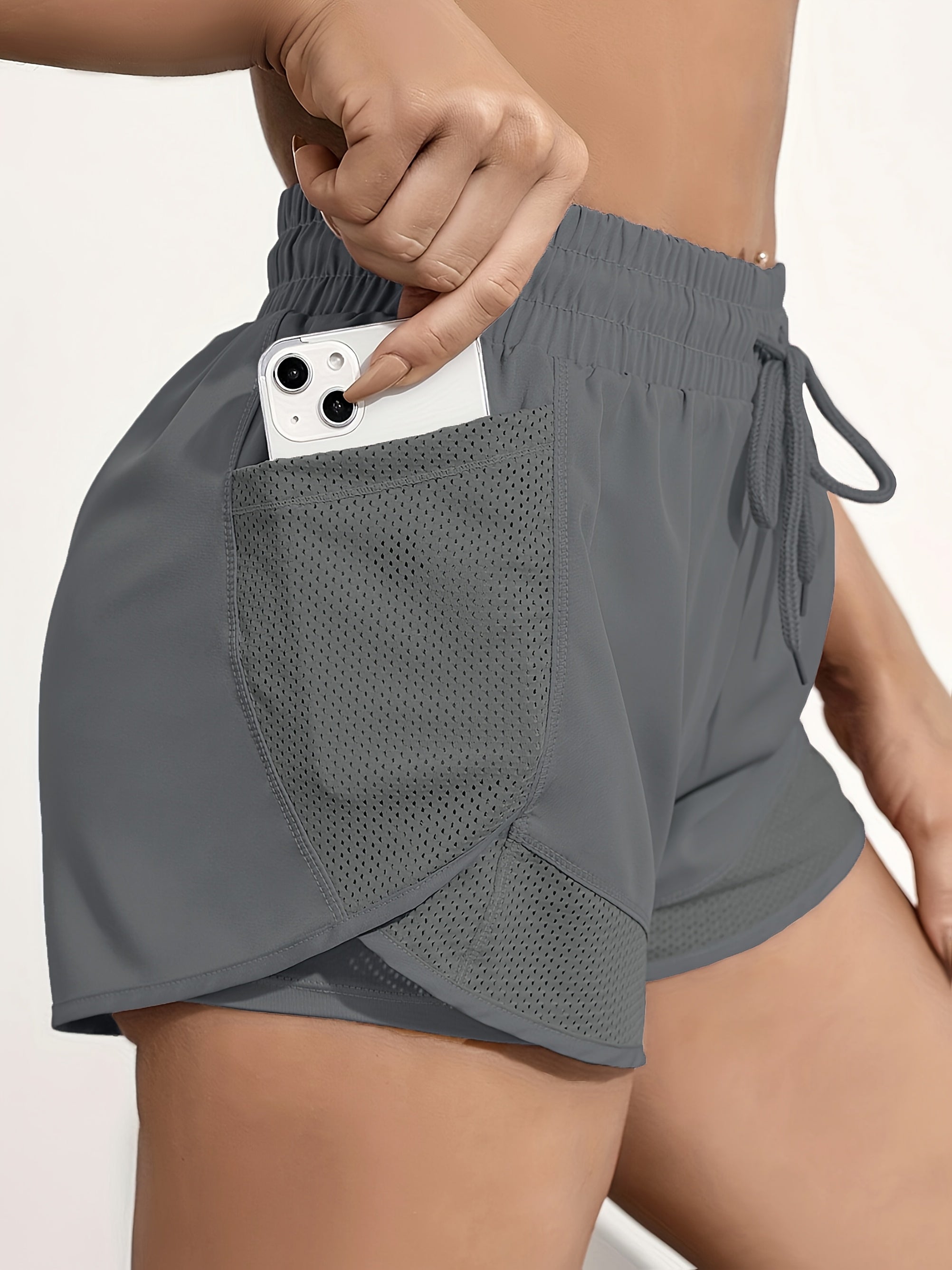 Shorts femininos de secagem rápida com bolso