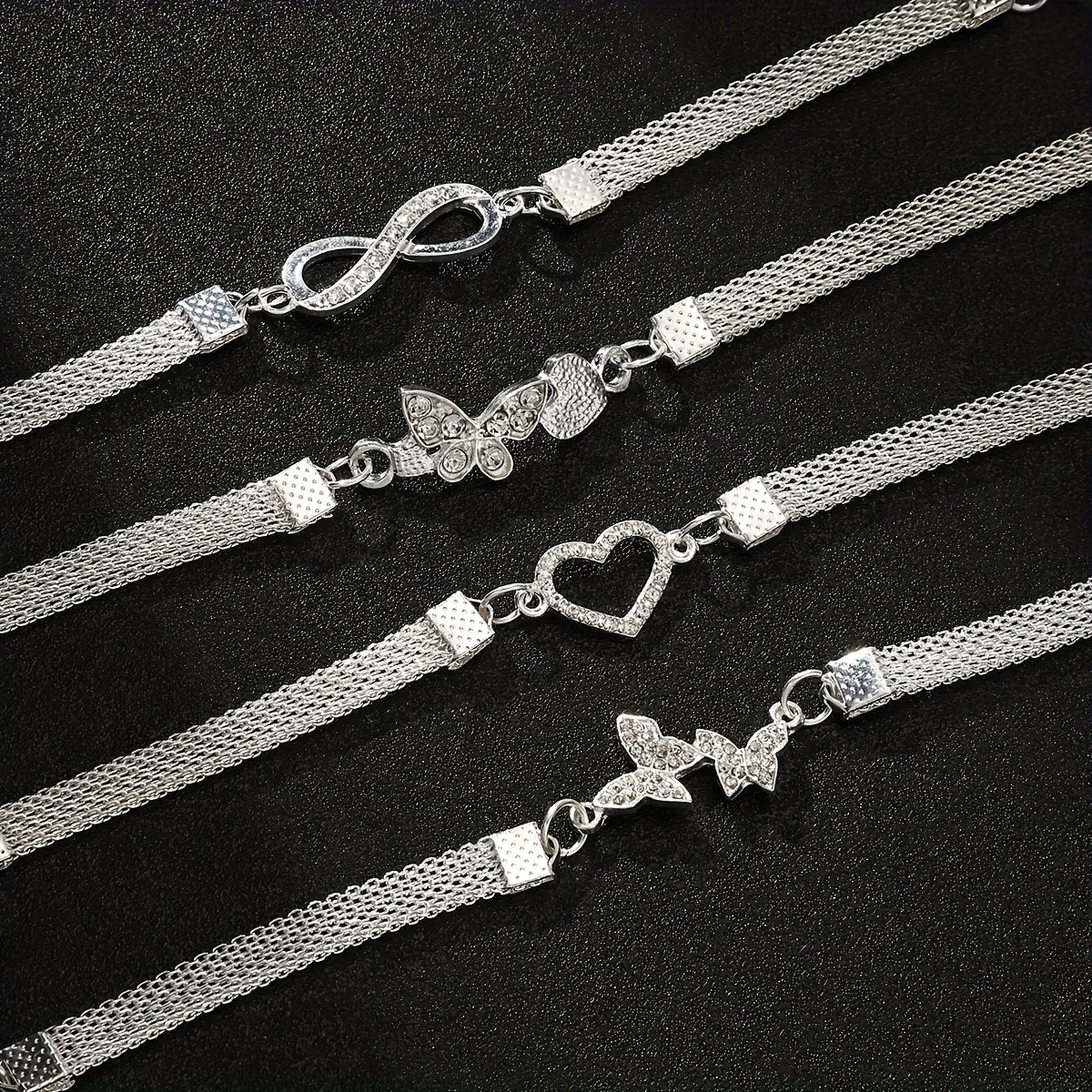 Conjunto de 4 peças de tornozeleira  com símbolo do infinito, borboleta e muito mais.